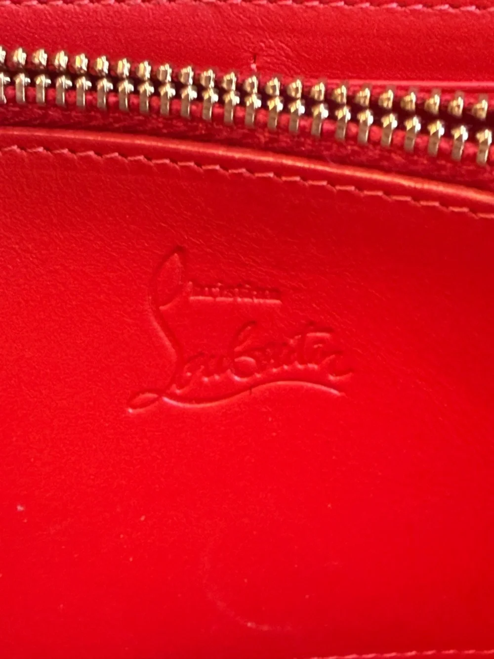Christian Louboutin ‘Turquoise Zippy Wallet’